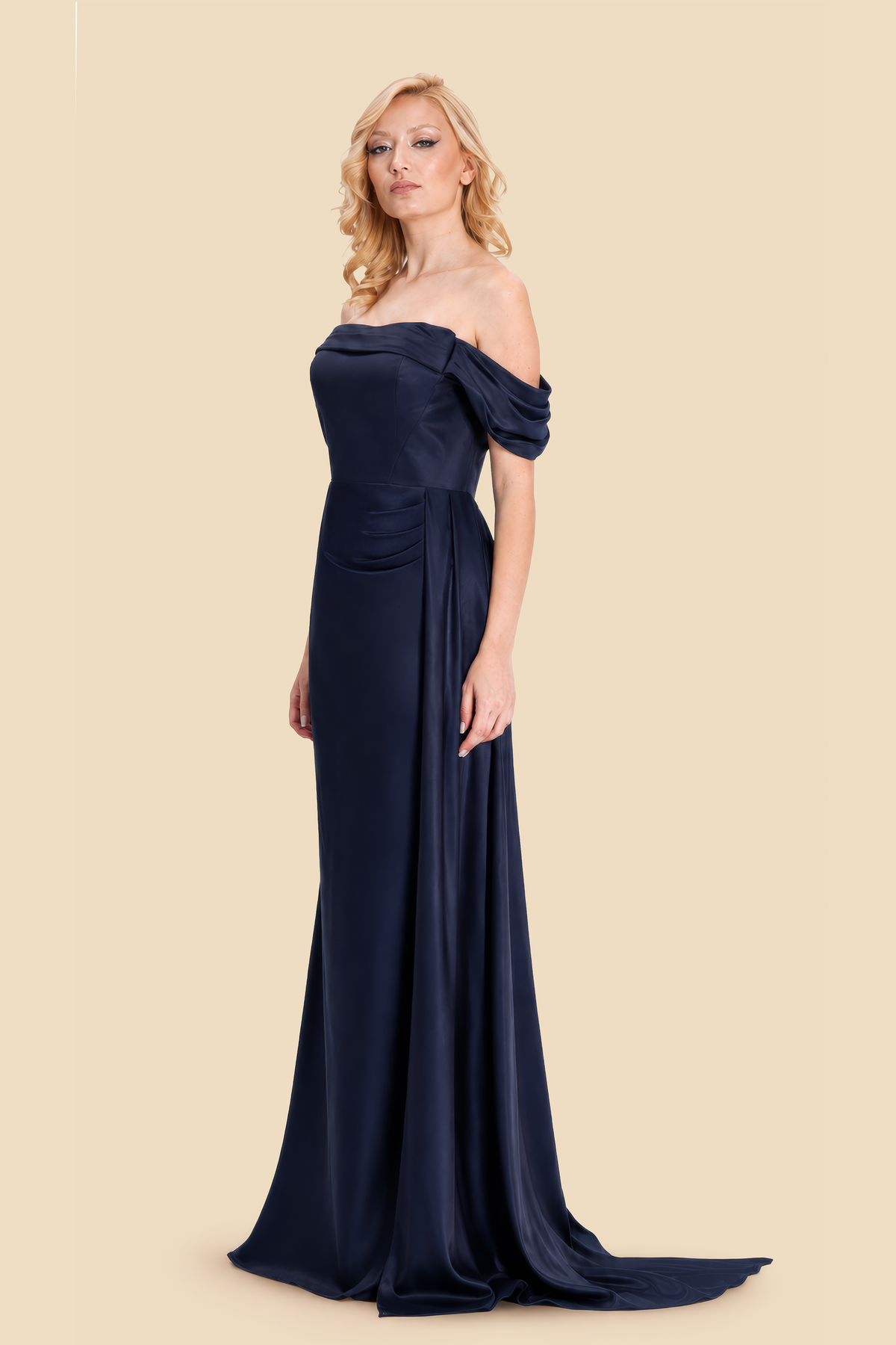 Navy viscose-silk off-shoulder draped gown, three-quarter front view, by Kerime Ataker