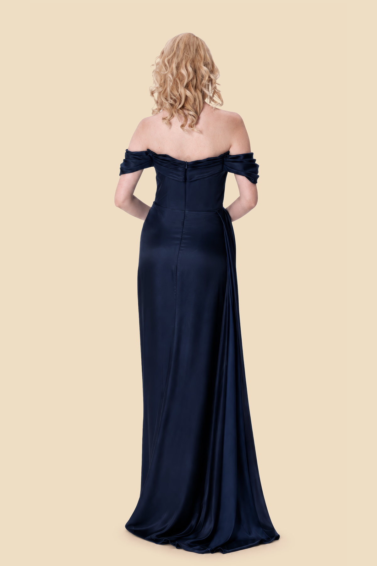 Front and back views of a navy viscose-silk off-shoulder gown by Kerime Ataker
